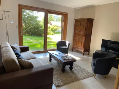Coin salon dans l'établissement Chalet luxueux avec piscine intérieure