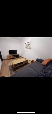 Télévision ou salle de divertissement dans l'établissement Appartement 4 personne