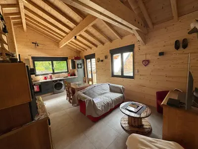 Un ou plusieurs lits dans un hébergement de l'établissement Chalet du saut de la bourrique, plain-pied, SPA couvert, terrain clôturé