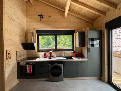 Cuisine ou kitchenette dans l'établissement Chalet du saut de la bourrique, plain-pied, SPA couvert, terrain clôturé