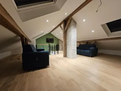 Coin salon dans l'établissement L'Escargot - Maison avec espace bien être privatif