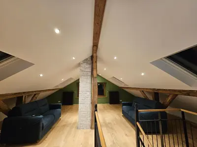 Coin salon dans l'établissement L'Escargot - Maison avec espace bien être privatif