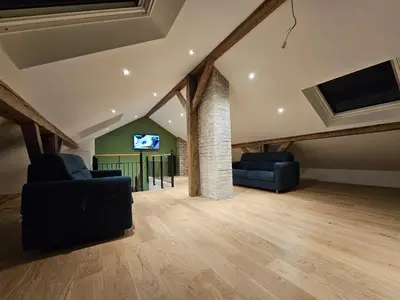 Coin salon dans l'établissement L'Escargot - Maison avec espace bien être privatif