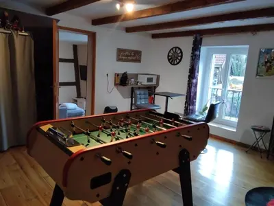 Salle de jeux dans l'établissement Ferme de la Ribotte