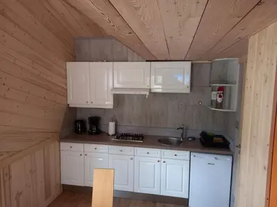 Cuisine ou kitchenette dans l'établissement CHALET DU PERE NOEL 10 minutes from Gérardmer