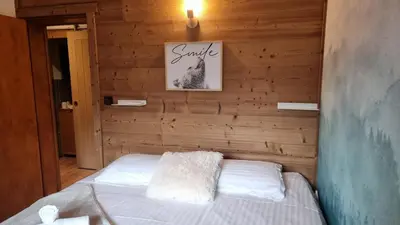 Un ou plusieurs lits dans un hébergement de l'établissement Chalet le Dahu-Calm-Jacuzzi-Free parking lot
