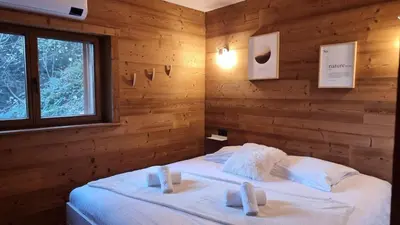 Un ou plusieurs lits dans un hébergement de l'établissement Chalet le Dahu-Calm-Jacuzzi-Free parking lot