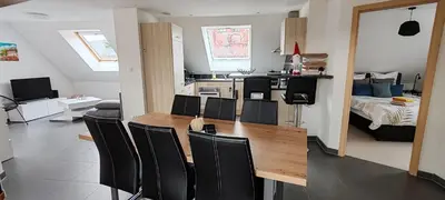 Cuisine ou kitchenette dans l'établissement Au coeur des vignes