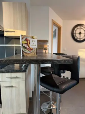 Cuisine ou kitchenette dans l'établissement Au coeur des vignes
