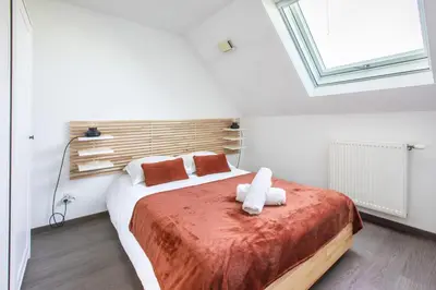 Un ou plusieurs lits dans un hébergement de l'établissement Le belle vue à Horbourg-Whir