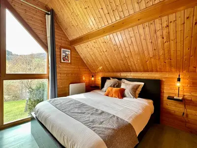 Un ou plusieurs lits dans un hébergement de l'établissement Chalet de Fréland