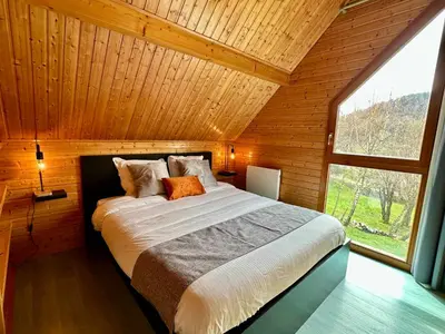 Un ou plusieurs lits dans un hébergement de l'établissement Chalet de Fréland