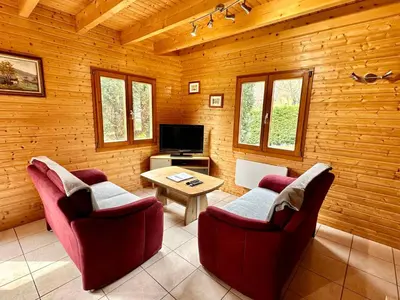 Télévision ou salle de divertissement dans l'établissement Chalet de Fréland
