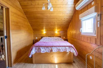 Un ou plusieurs lits dans un hébergement de l'établissement AH Large apartment 1 a 7 pers 3 stars WiFi