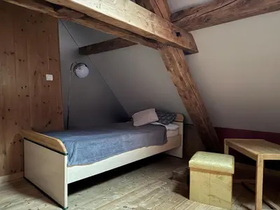 Un ou plusieurs lits dans un hébergement de l'établissement Beau duplex proche centre