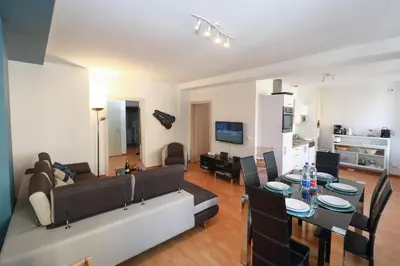 Télévision ou salle de divertissement dans l'établissement COLMARAPPART Grand'Rue