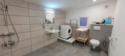 Salle de bains dans l'établissement Chez Marcel