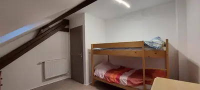 Un ou plusieurs lits dans un hébergement de l'établissement appart masevaux 103 m2