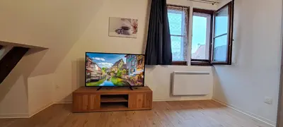 Télévision ou salle de divertissement dans l'établissement Le Coin Zen
