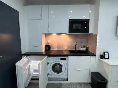Cuisine ou kitchenette dans l'établissement Nice Studio 2 pers Near Basel stationnement gratuit