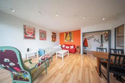 Coin salon dans l'établissement Marne 29 Logement Mulhouse Proche Tram Autoroute