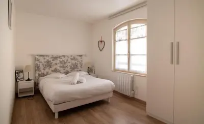 Un ou plusieurs lits dans un hébergement de l'établissement Bel appartement au centre de Colmar