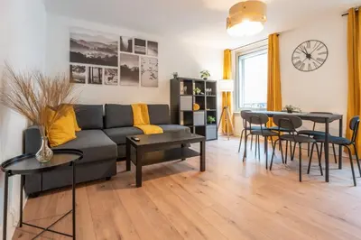 Coin salon dans l'établissement Merles 15 1er Etage Centre Mulhouse Stationnement