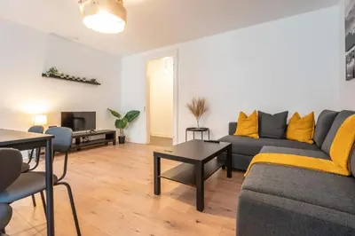 Coin salon dans l'établissement Merles 15 1er Etage Centre Mulhouse Stationnement