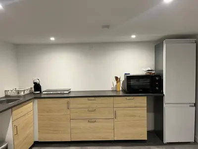 Cuisine ou kitchenette dans l'établissement Les chambre de Marie studio Rez de chaussé