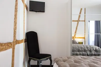 Un ou plusieurs lits dans un hébergement de l'établissement MY SWEET HOMES - Appartements avec SPA