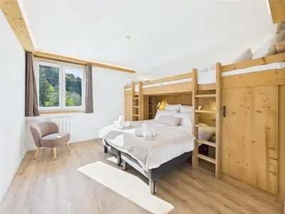 Un ou plusieurs lits dans un hébergement de l'établissement Le Petit Paradis, Spa-Sauna and Gym