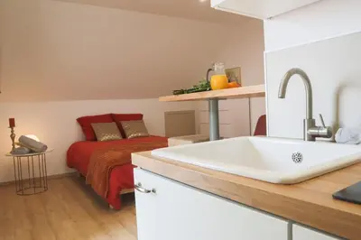 Cuisine ou kitchenette dans l'établissement La Suite Allure
