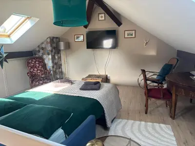 Un ou plusieurs lits dans un hébergement de l'établissement Le petit nid de Turckheim avec parking privé