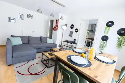 Coin salon dans l'établissement Theatre 27 Logement Hyper Centre Mulhouse Parking