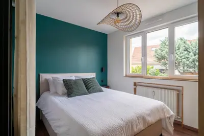 Un ou plusieurs lits dans un hébergement de l'établissement Suite Zen - Calme et Lumière - 2 lits 160 cm - Parking privé résidence