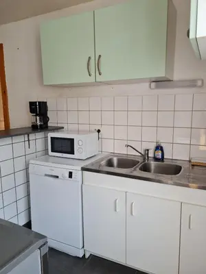 Cuisine ou kitchenette dans l'établissement Joli appartement 4 personnes à la campagne