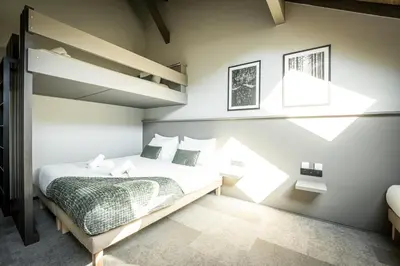 Un ou plusieurs lits dans un hébergement de l'établissement Hôtel L'Echappée Vosgienne - Nature - Récupération - Sport - 300m du lac