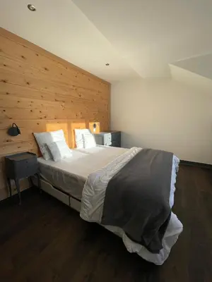 Un ou plusieurs lits dans un hébergement de l'établissement Lysgaard Cosy Cottage