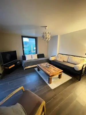 Coin salon dans l'établissement Lysgaard Cosy Cottage