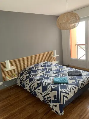 Un ou plusieurs lits dans un hébergement de l'établissement Chez Mathias 2 bedrooms 2 beds cribs garage