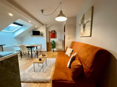 Coin salon dans l'établissement Le Repos du Voyageur, près centre-ville et pistes de ski