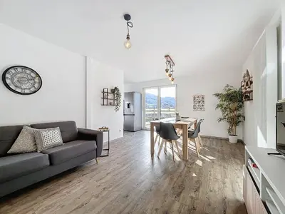 Coin salon dans l'établissement Hopla Gîte