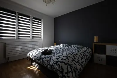 Un ou plusieurs lits dans un hébergement de l'établissement Rare Maison moderne proche centre avec jardin parking gratuit