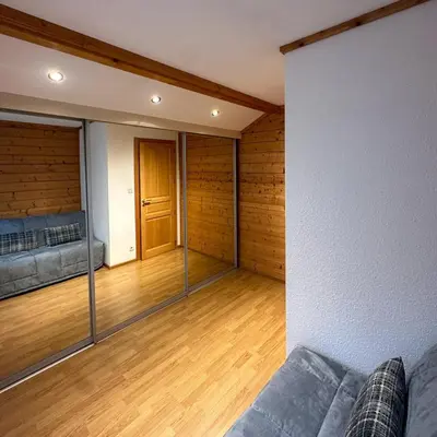 Coin salon dans l'établissement Chalet 3 Vallées - Piscine & SPA - Haut Standing