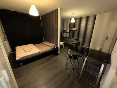 Un ou plusieurs lits dans un hébergement de l'établissement Appartement Centre ville
