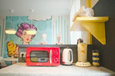 Cuisine ou kitchenette dans l'établissement Popart Insolite Jacuzzi,Sauna & SPA Parking free