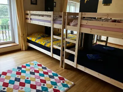 Un ou plusieurs lits dans un hébergement de l'établissement Au pied du Lac