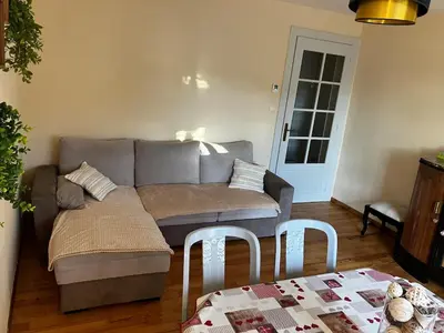 Coin salon dans l'établissement Au pied du Lac