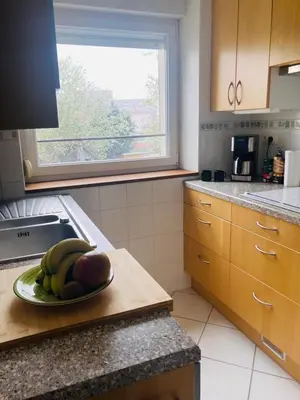 Cuisine ou kitchenette dans l'établissement Au pied du Lac