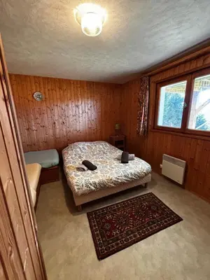 Un ou plusieurs lits dans un hébergement de l'établissement Chalet avec superbe vue dégagée - 10 min de Gérardmer